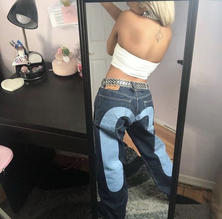 נינה | מכנסיים אופנתיים – גזרה ישרה ודפוס לב שבור