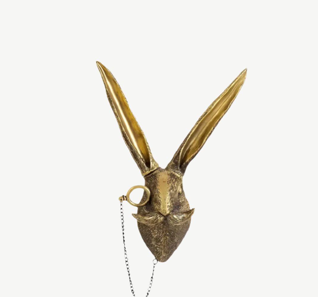 Decoratieve gouden wandhaak - Discrete elegantie & glanzende afwerking