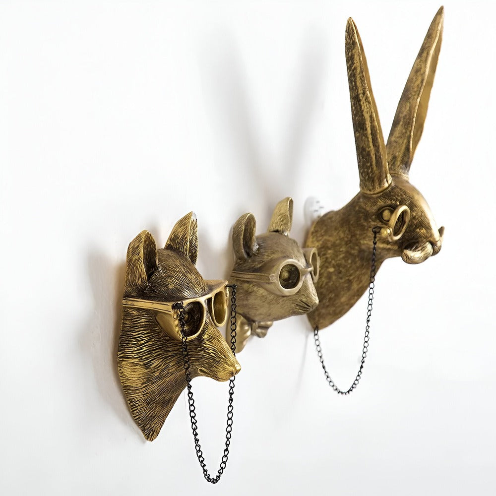 Decoratieve gouden wandhaak - Discrete elegantie & glanzende afwerking